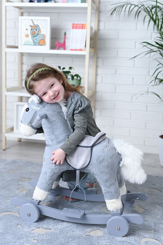 Konik na biegunach siwek z kołami  | Adam Toys